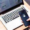 Phone with multi-factor authentication reflecting the essential 8 cyber security principles.