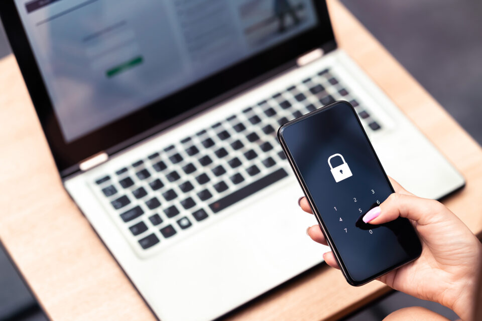 Phone with multi-factor authentication reflecting the essential 8 cyber security principles.